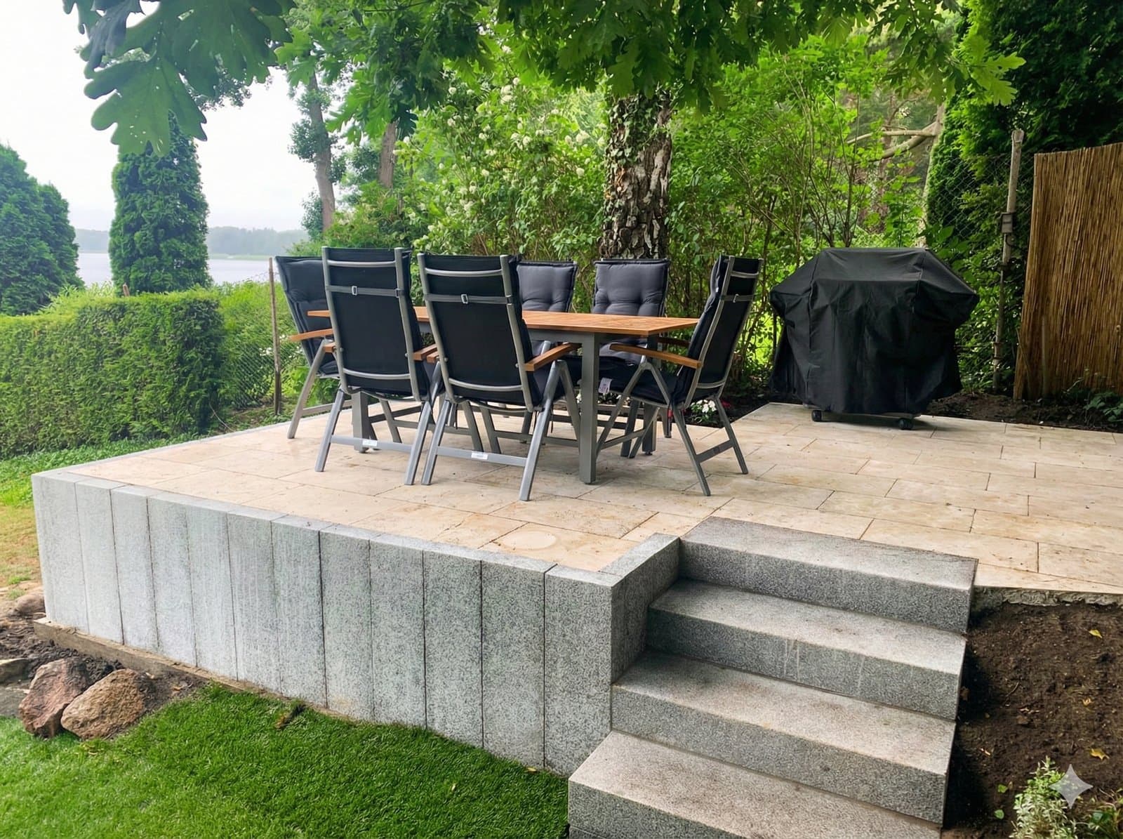 Outdoor patio with stone-effect tiles.