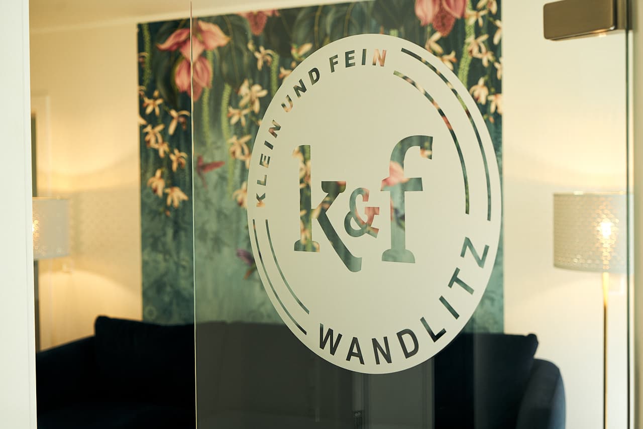 A stylish, modern kitchen with clean tiled floors. Replace with /your-hero-image.jpg